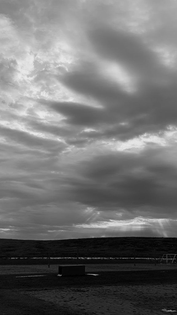 Light streaming down thru winter clouds